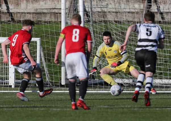 Ruairi Paton (number 9) slots home a penalty for Gala Faairydean Rovers against East Stirlingshire.