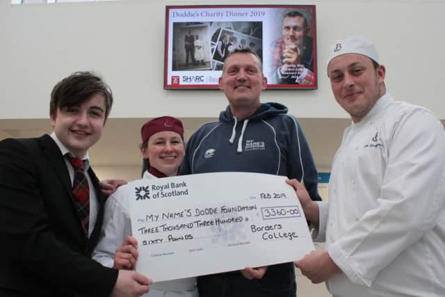 A dinner at Borders College in Galashiels raised £3,360, and it was presented to Doddie Weir by, from left, students Billy Brogan, Ann Letham and Ben Cruickshank.