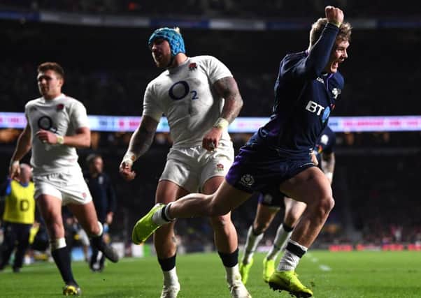 Ex-Hawick winger Darcy Graham celebrates scoring Scotland's fourth try agaisnt England at Twickenham (photo by Laurence Griffiths/Getty Images).