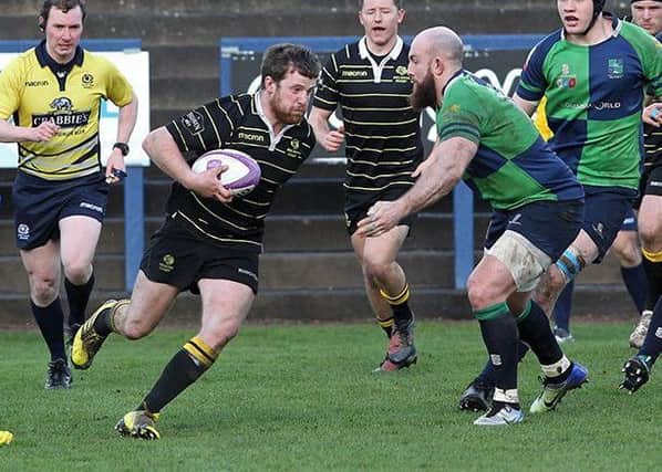Grant Runciman, captain, on the ball for Melrose in their last match against Boroughmuir.