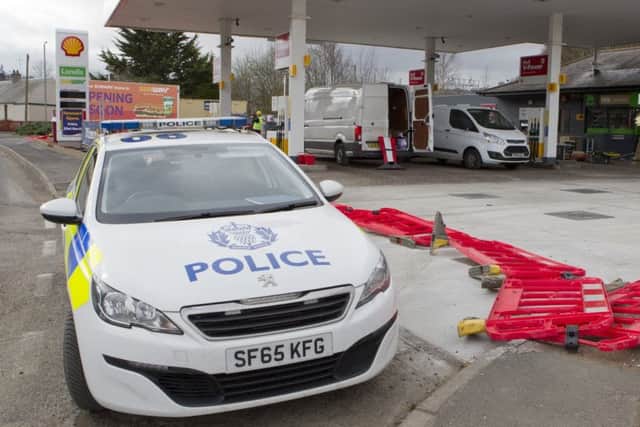 Police checking for CCTV footage at Shell Garage in Jedburgh after several tradesmens' vans were hit by theives last night.