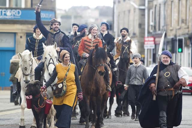 Les Amis d'Onno Horse stunt team, led the Reivers parade onto the high Street