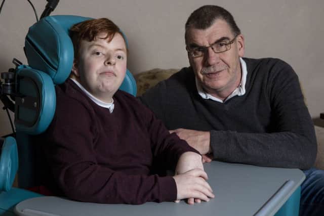 Stroke sufferer Darren Thomson with dad Phil. Photo: Katielee Arrowsmith/SWNS