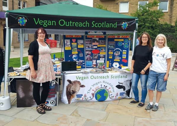 Spreading the message...Julie McLean (left) hopes vegan-curious people in the Borders will take time out to visit the stall in Galashiels on Saturday, April 20.