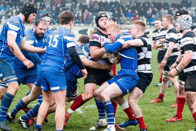 Tight, close-up action in the Borders derby between Kelso and (in blue) Jed-Forest (picture by Gavin Horsburgh).