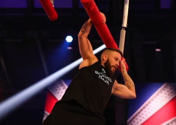 Ali Hay in action on the Ninja Warrior UK obstacle course.