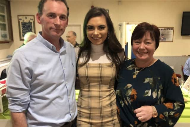 Emily Wilkinson with with mum Sandra and dad Tommy.