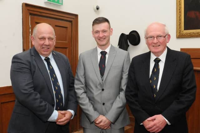 Standard bearer Craig Monks with silver and golden jubilee men Craig Stanners, left, and Johnnie Thomson.