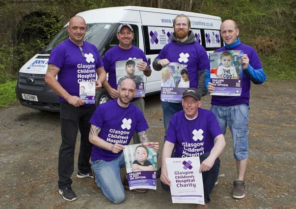 The intrepid crew with a minibus donated for the day by Cooks Van Hire in Newtown  back row from left, Sean Fraser, Barry Simpson, Lee Sinclair and Jamie Revels and, front,  James Mains and Alan Morrison. Not pictured are Cameron Rice, Gordon Grant, Chris McCabe and Stuart Thornton.