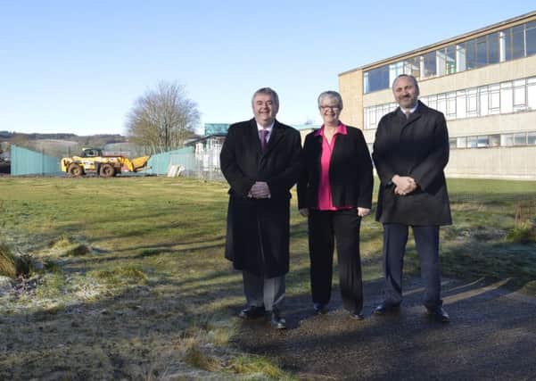 Scottish Borders Council convener David Parker, ex-councillor Frances Renton and Nile Istephan, chief executive of Eildon Housing Association, at the former Earlston High School site.