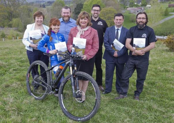 Kathy Gilchrist, Isla Short, Graham McLean, tourism secretary Fiona Hyslop, Danny Cowe, Nick Antonopoulis and Geraint Florida-James at Glentress on Tuesday for the announcement of the £185,000 payout.
