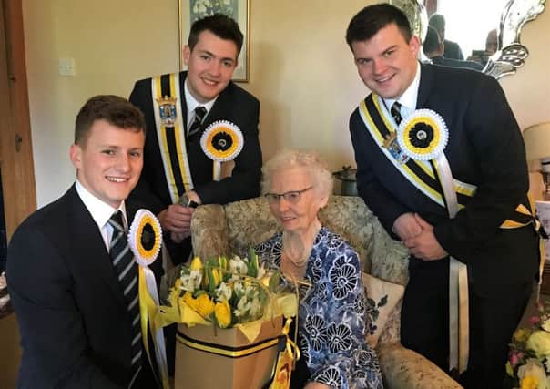Melrosian-elect Ben Magowan visits Kathleen Dun with his right and left-hand men.