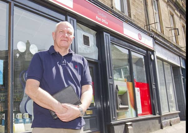 Councillor Watson McAteer at Hawick's Sandbed Post Office.