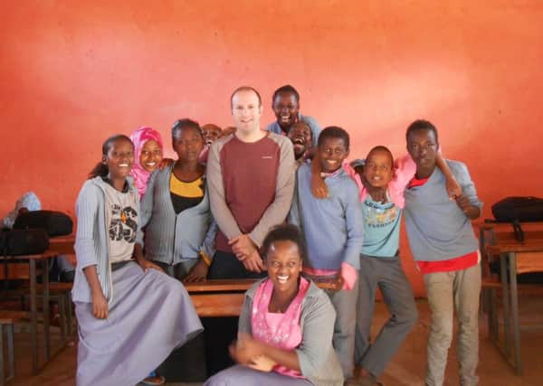 Teaching children in Ethiopia...was Dominic Taddeis first stop in Africa, before moving on to Kenya and Uganda.