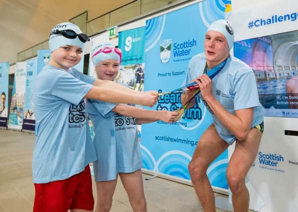 Duncan Scott helps promote the Learn to Swim venture in a light-hearted fashion (picture by Stuart Nicol).