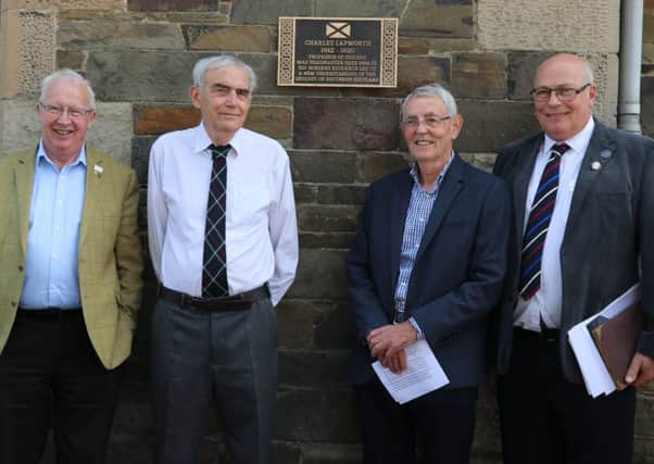 Stuart Monro of the Royal Society of Edinburgh, local historians David Adamson and Malcolm Lindsay and Murray Dickson, president of the Old Gala Club History Society, at the unveiling of the commemorative Charles Lapworth plaque in Galashiels.