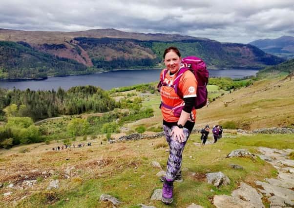 Lynne Grassic, of Selkirk, raises £1,400, for Meningitis UK by completing the Lake District Eight Peak Challenge.