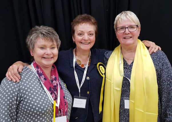 SNP candidate Heather Anderson, centre, seen enjoying the count with fellow SNP councillors Elaine Thornton Nichol and Claire Ramage.