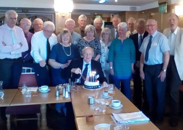 Kelso Rotarian Hector Innes cut his 90th birthday cake and fellow members sang Happy Birthday at a club meeting.