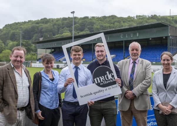 Promoting Made in Hawick are, from left, the Borders Distillery's John Fordyce, project manager Sarah Macdonald, Darcy Graham, Stuart Hogg, Future Hawick chairman Derick Tait and Lesley Landels of Love Scottish Candles.  (Photo: Rob Gray)