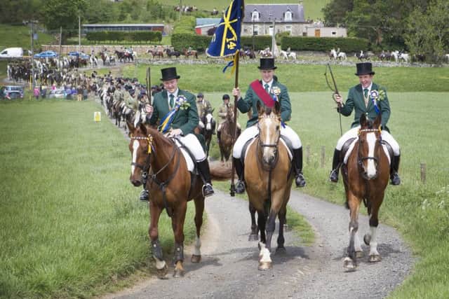 Action and revellers on Common Riding Friday in Hawick.