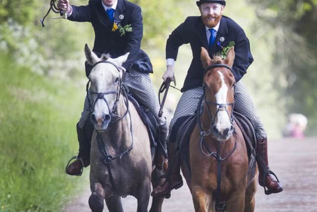 Action and revellers on Common Riding Friday in Hawick.