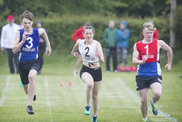 Kai Lennie (3), Shellee Fojick (2), Callum Shiel (1) in the second heat of the 13-16year 90m Handicap (picture: Bill McBurnie)