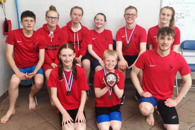 The Duns squad celebrate winning first place