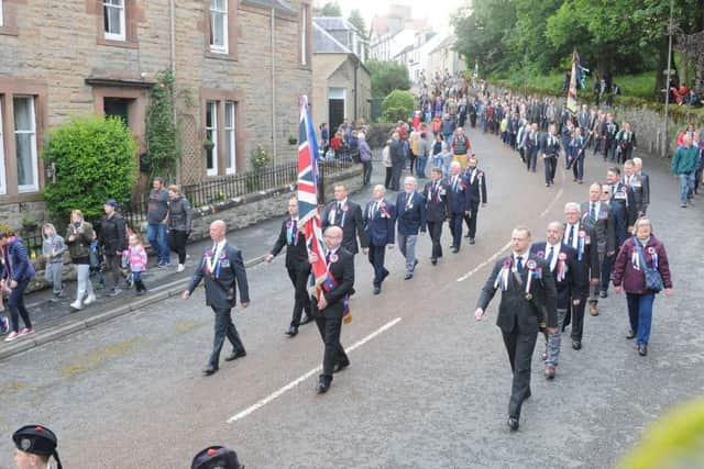 Justin Gilchrist leads the Ex-Soldiers Doon the Green.