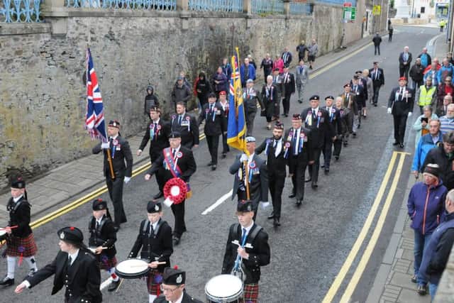 Ex-Soldiers on their way to the Act of Remembrance at 5.30am.