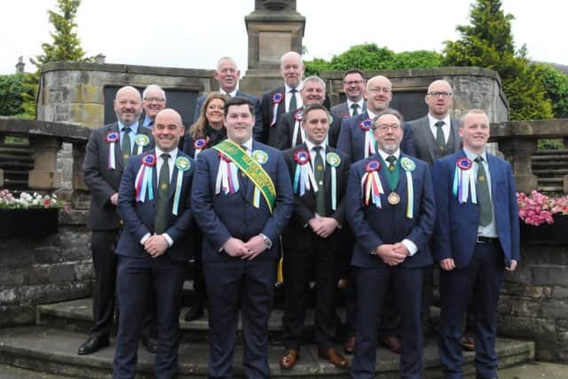 Merchant Company members with their standard bearer Bruce Riddell.