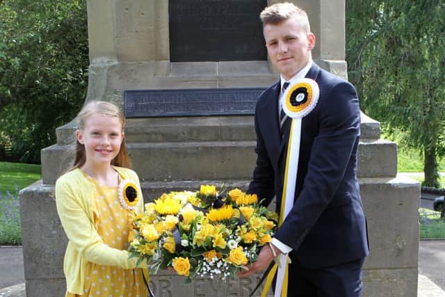 Sunday's wreath-laying ceremony and football tournament.
