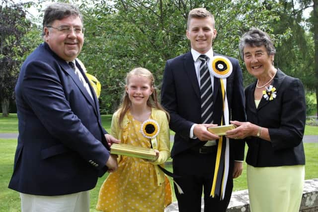 Sunday's wreath-laying ceremony and football tournament.