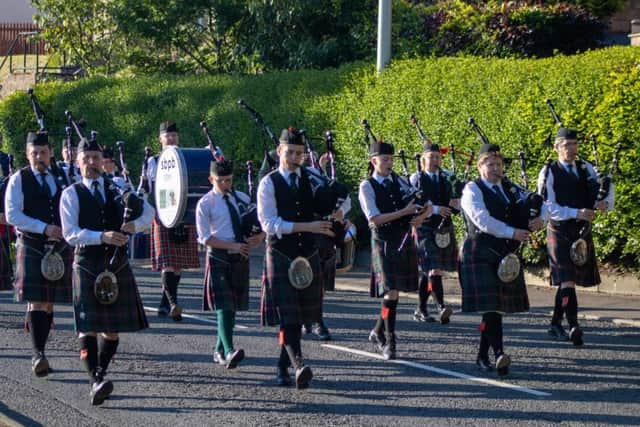 Stow Pipe Band leads the fancy dress parade on Friday night.