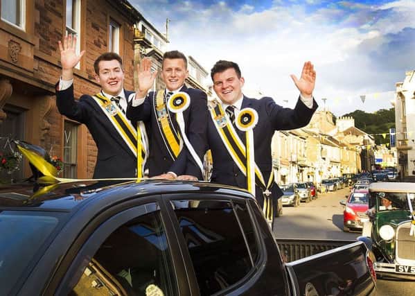 Melrosian Ben Magowan and his right and left-hand men harry Fletcher and Russell Mackay parade around the town following the ceremony.