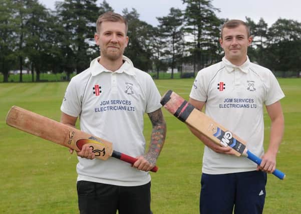 Profitable partnership ... Jordan Reid, 71 not out, and Greg Fenton, 117 not out for Selkirk (picture by Grant Kinghorn).
