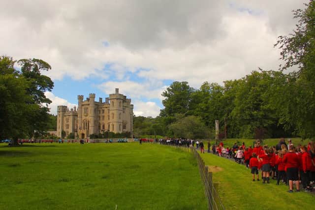 Heading towards the castle, school children from Berwickshire High and Duns Primary prepare for their star performance. (Pic: Jonathan Findlay)