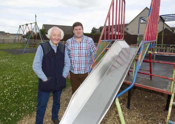 Kelso community councillors Colin McGrath and Dean Weatherston at the playpark next to the High Croft Co-op.