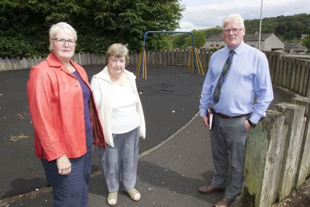 Councillors Clair Ramage and Stuart Marshall with Burnfoot Community Council chairman Anne Knight at the Burnfoot playpark.