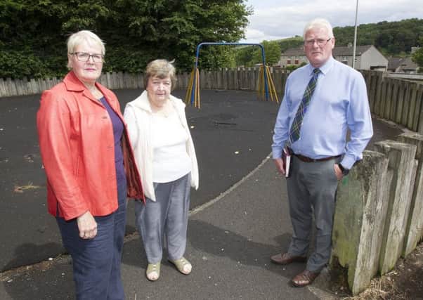Councillors Clair Ramage and Stuart Marshall with Burnfoot Community Council chairman Anne Knight at the Burnfoot playpark.