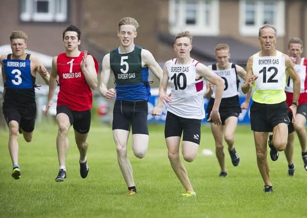 Jai Patterson (number 10) wins his heat in the 200m on Kelso's Summer Games day (picture by Bill McBurnie).