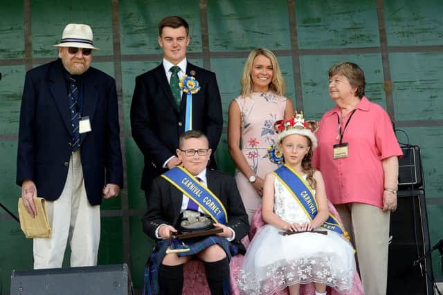 From left, Burnfoot Community Council vice-chairman Jamie Batten, Hawick Cornet Connor Brunton, cornet's lass Victoria Campbell, community council chairperson Ann Knight, Burnfoot lad Ryan Scott and carnival queen Leah Bell at Burnfoot Carnival.