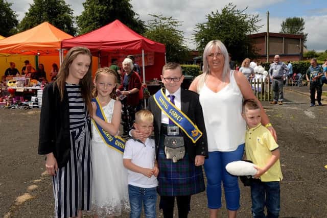 Burnfoot Carnival queen Leah Bell with her mum Stacey Reilly and lad Ryan Scott with his mum Amanda Robertson and other family members.