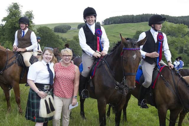Christine and Kathryn Wylie hand out refreshments from the community at Edgerston House.