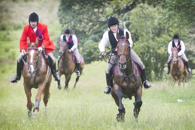Herald Rob Reid and Callant Euan Munro lead the cavalcade to Redesire.