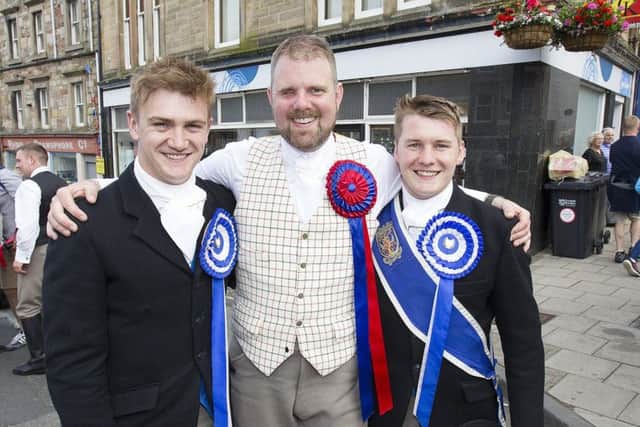 Herald Rob Reid with Kelso Laddie Mark Henderson and left-hand man Craig Logan.