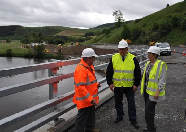Councillors Stuart Bell, Gordon Edgar and Shona Haslam at the notorious Dirtpot Corner on the A72.