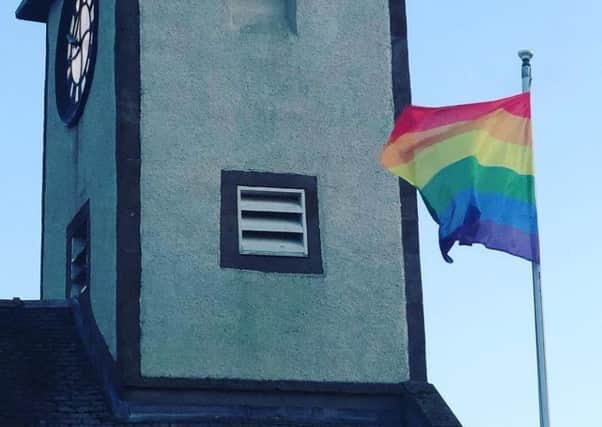The pride flag was flown at the town hall last month.