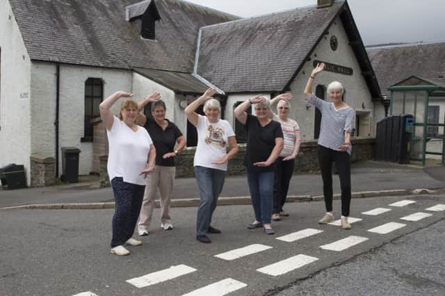 Walkerburn Tai chi members Wilma Oliver, Kareen Hogg, Jean Anderson, Win Pennel, Anne Glendinning and Lesley Thornton celebrate locality bid funding which will secure the future of Walkerburn Public Hall.