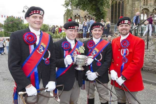 Callant Euan Munro with his henchmen at the conclusion of Friday's ceremonial ride.